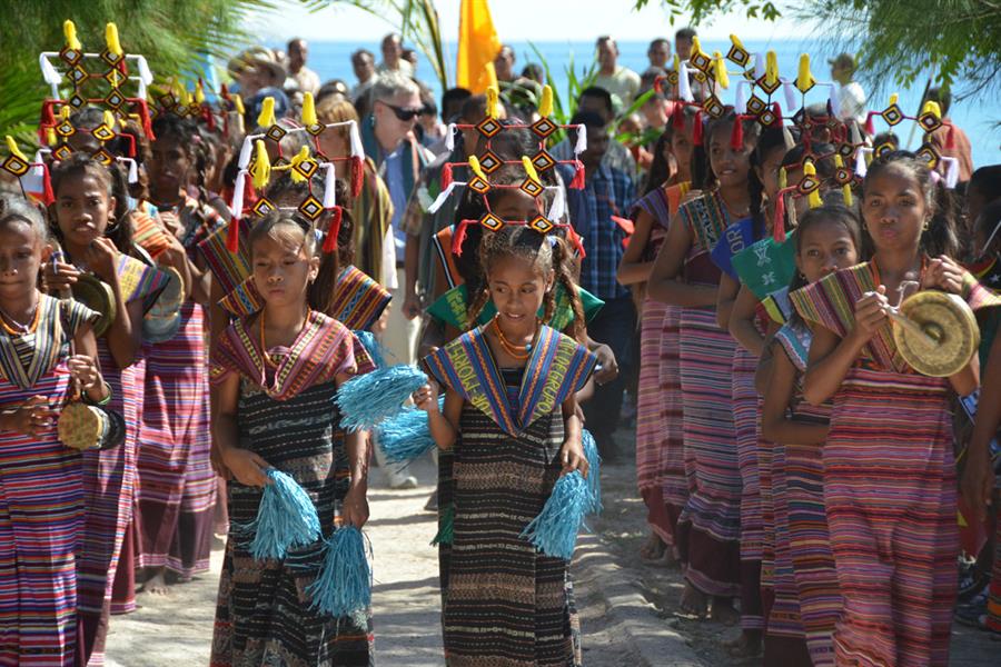 Children dressed in traditional Timorese dancer costumes