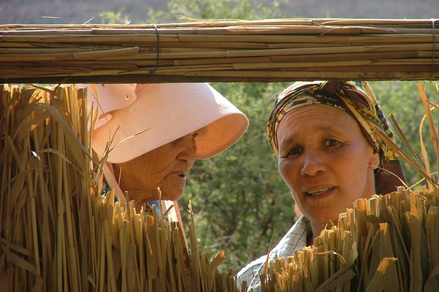 ci_54113145 Two Nama Khoi ladies outside their home