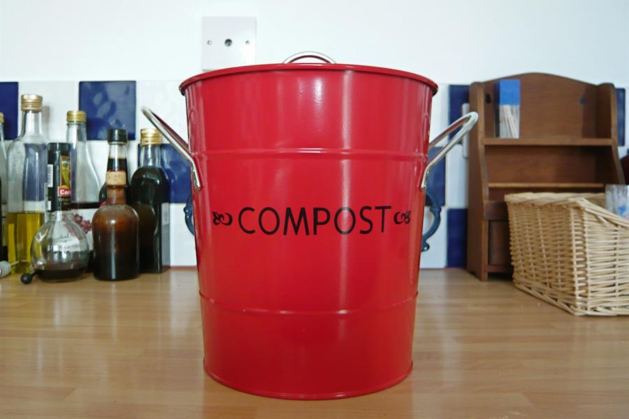 ci_57285309 A red compost bin.